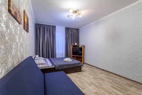Гостиная зона в Economy Brusnika Apartment Vykhino