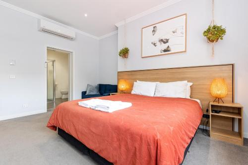 Postel nebo postele na pokoji v ubytování Civic Apartments
