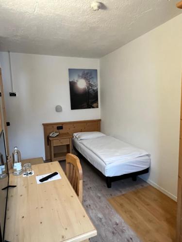 Ein Bett oder Betten in einem Zimmer der Unterkunft Hotel Zanella