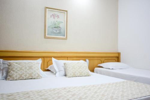 Cama ou camas em um quarto em Biazi Paradise Hotel