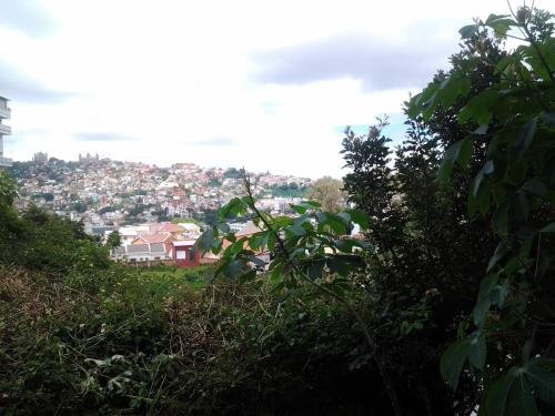 a view of a city from the top of a hill at B&B Au Triporteur in Antananarivo