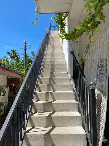 a stairway leading up to a building at Nimal's House in Dickwella