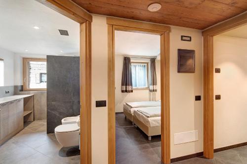 Koupelna v ubytování Rasia Residence Relax Mountain