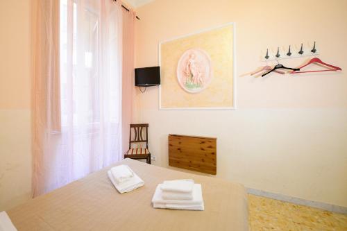Postel nebo postele na pokoji v ubytování GuestHouse o Affittacamere Magenta Baylon Suite