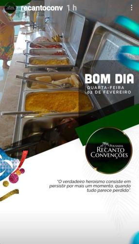 a row of trays of food on a buffet line at Recanto Convenções in Olinda