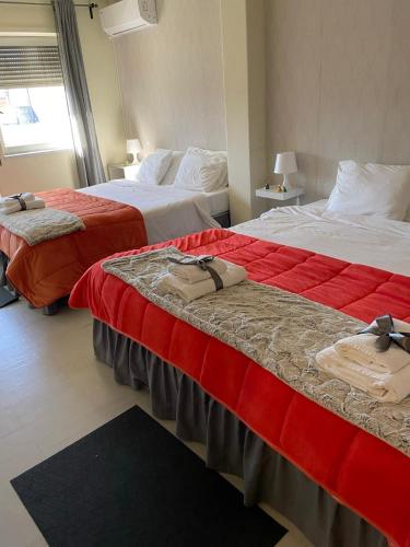 Ένα ή περισσότερα κρεβάτια σε δωμάτιο στο Liber Guest House