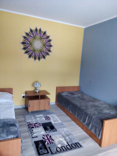 Ένα ή περισσότερα κρεβάτια σε δωμάτιο στο Motelik Lukitas