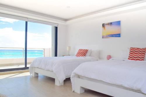 Foto da galeria de Beachfront apartment Marlin Villa 107 em Cancún