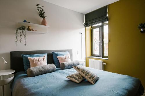 Кровать или кровати в номере Hoeve de Reetjens - Le Marie