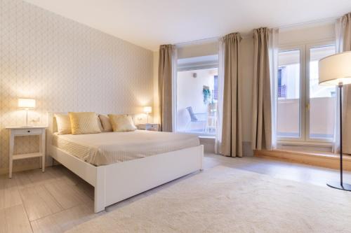 A bed or beds in a room at Studio Apartments Boutique Al Bastione di Cagliari