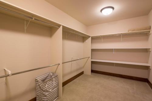 a walk in closet with shelves at Chilali 25 in Ketchum