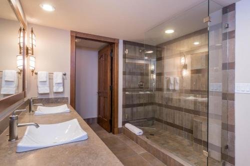 a bathroom with a shower and a sink at Chilali 25 in Ketchum