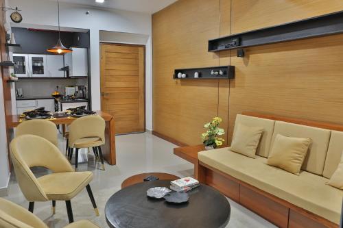 a living room with a couch and a table at 007 Colombo in Colombo