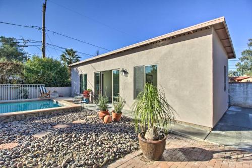 a house with a pool and plants in front of it at Less Than 3 Mi to U of A Poolside Oasis in Tucson! in Tucson