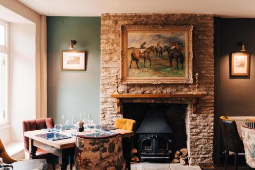 Zona de estar de Cat and Custard Pot Inn