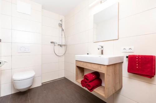Ένα μπάνιο στο Herzstück Appartements Zillertal