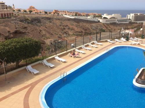 Výhled na bazén z ubytování Appartement à Playa Paraiso nebo okolí