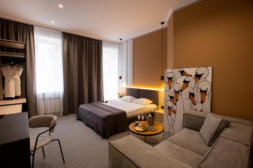 Кровать или кровати в номере Kulikovskiy hotel