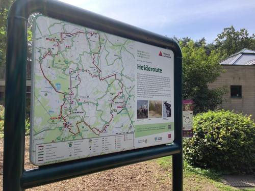 a large sign with a map of attractions at 't Greefsch Geluck in Kalmthout
