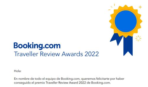 a logo for a travel review awards at ENHEBRA HOUSE in Lima