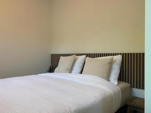 Postel nebo postele na pokoji v ubytování Northgo apartment