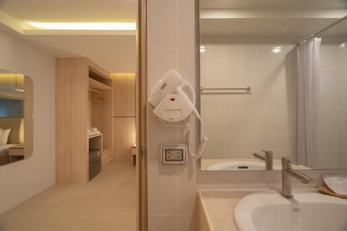 Ein Badezimmer in der Unterkunft Bedline Hotel - SHA Certified
