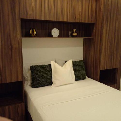 Cama o camas de una habitación en Hermoso condominio con alberca climatizada