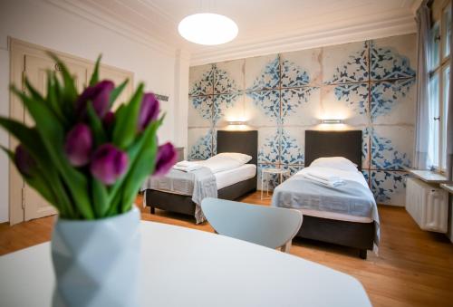 Katil atau katil-katil dalam bilik di Aparthotel Villa Elon