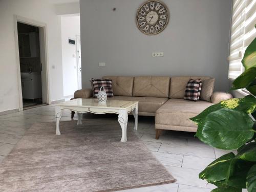Гостиная зона в BELKA GOLF RESIDENCE Exclusive apt DeluxBELEK