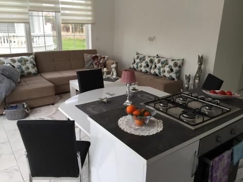 Гостиная зона в BELKA GOLF RESIDENCE Exclusive apt DeluxBELEK
