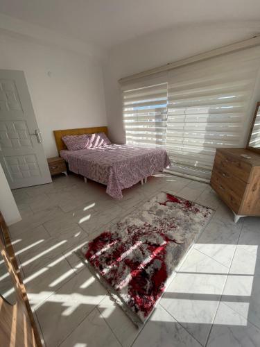 Кровать или кровати в номере BELKA GOLF RESIDENCE Exclusive apt DeluxBELEK