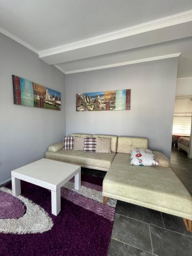 Кровать или кровати в номере BELKA GOLF RESIDENCE Exclusive apt DeluxBELEK