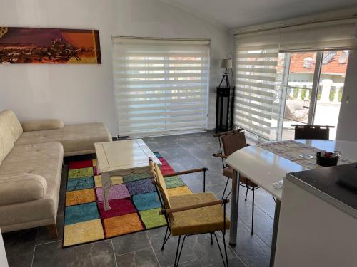 Гостиная зона в BELKA GOLF RESIDENCE Exclusive apt DeluxBELEK