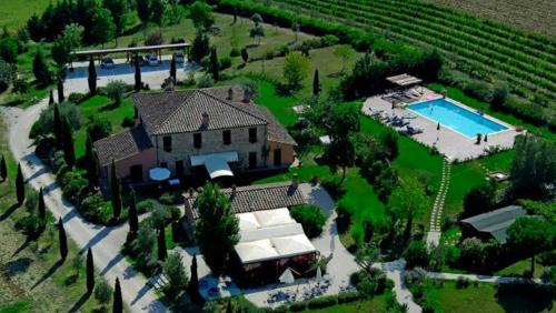 Bazén v ubytovaní Agriturismo I Romiti alebo v jeho blízkosti