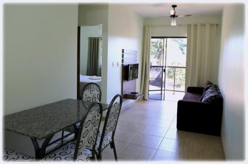 A seating area at Bonito Residencial Flat