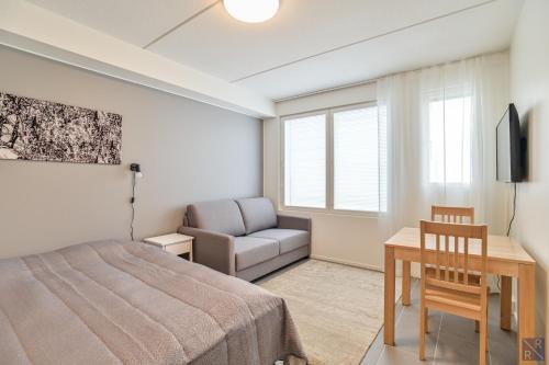 Postel nebo postele na pokoji v ubytování Holiday In Lapland - Levi Postintie 3B 322