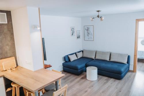 Svetainės erdvė apgyvendinimo įstaigoje Neringarent Apartamentai