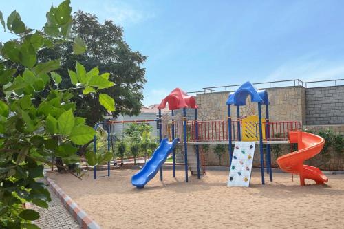 a playground with a slide and a slideintend at Radisson Blu Resort Visakhapatnam in Visakhapatnam