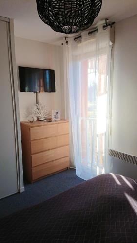 Postel nebo postele na pokoji v ubytování Appartement cosy à Dax avec piscine partagée - 65 m².