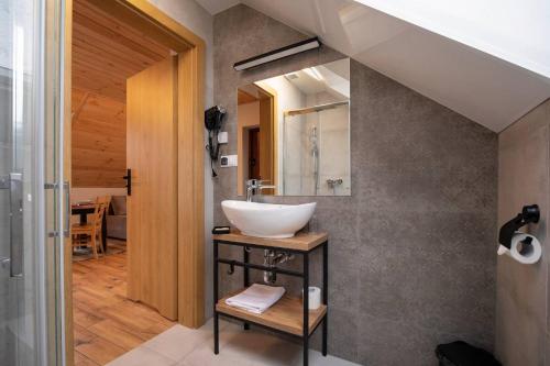 Ванная комната в Osada Wróblonki - Apartamenty