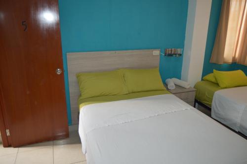 Hostal El Naufrago 1にあるベッド