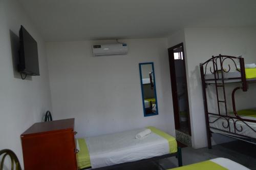 Hostal El Naufrago 1にあるベッド