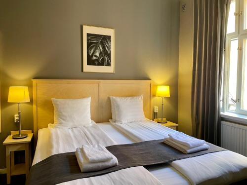 Кровать или кровати в номере Unique Hotel