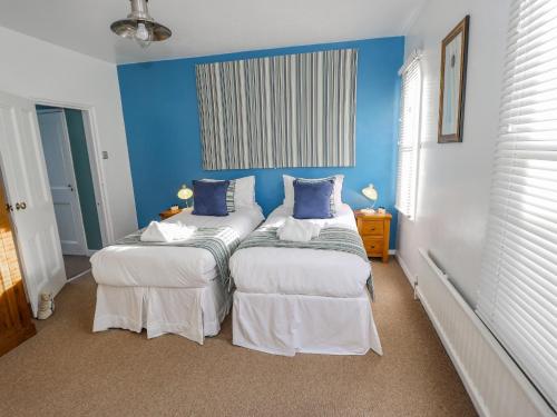 Ένα ή περισσότερα κρεβάτια σε δωμάτιο στο The Townhouse