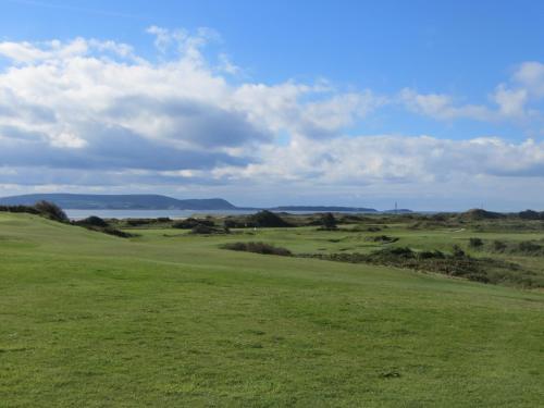 a view of the green on the golf course at Four seasons Guest House in Pembrey