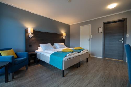 Кровать или кровати в номере Thon PartnerHotel Måløy