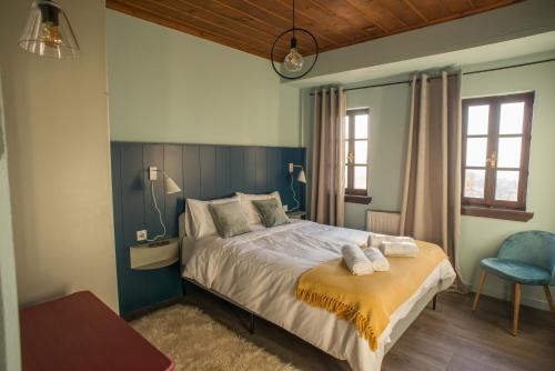 Postel nebo postele na pokoji v ubytování Charis Guesthouse