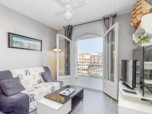 Televízia a/alebo spoločenská miestnosť v ubytovaní Apartment Port Salins by Interhome