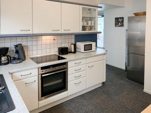 Kuchyň nebo kuchyňský kout v ubytování Apartment Stark by Interhome