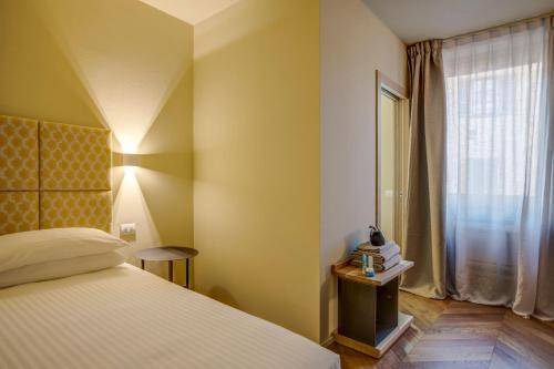 Hotel Borgo Imperoにあるベッド